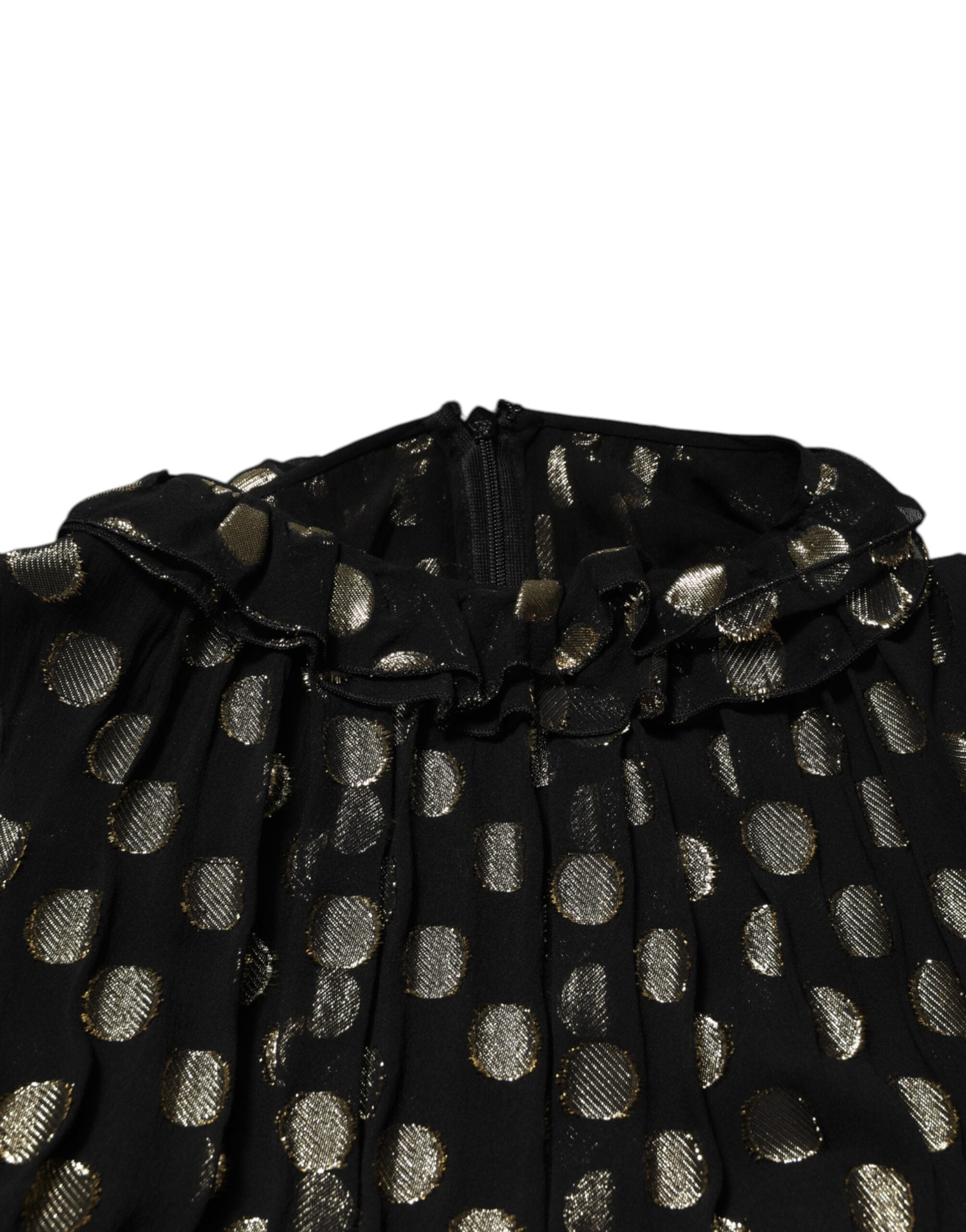 Robe courte en soie à pois dorés et noirs de Dolce & Gabbana, tissu brodé élégant avec motif à pois.