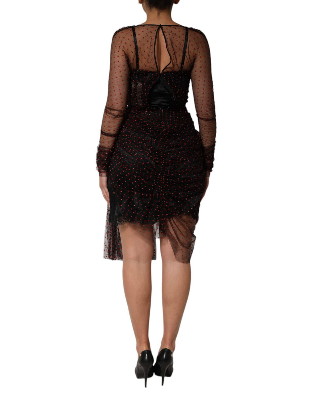 Robe courte noire Dolce & Gabbana en dentelle avec manches longues et coupe ajustée, élégante et raffinée.