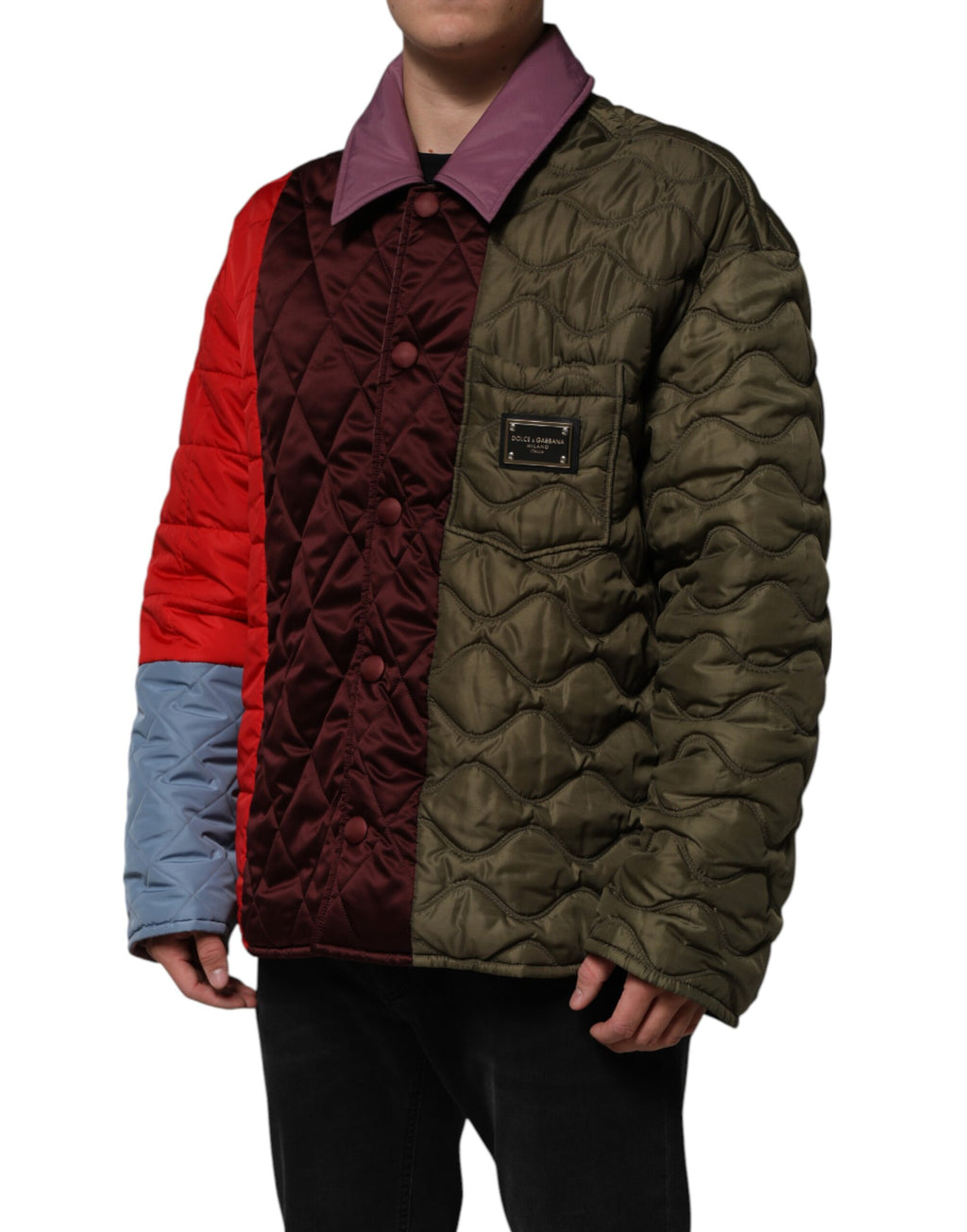 Veste matelassée en polyester multicolore Dolce & Gabbana avec patchwork, style tendance et détails colorés visibles sur l'image.