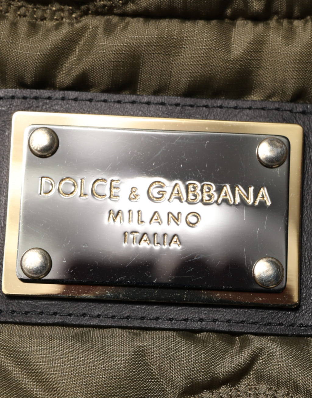Veste matelassée Dolce & Gabbana multicolore en polyester à patchwork, avec design élégant et détails colorés.