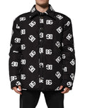 Veste coupe-vent en nylon noir Dolce & Gabbana avec monogramme DG, ajustée avec capuche et fermeture éclair.