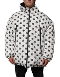Veste matelassée blanche à capuche Dolce & Gabbana DG Monogram, style chaud et élégant, vue de face avec logo visible
