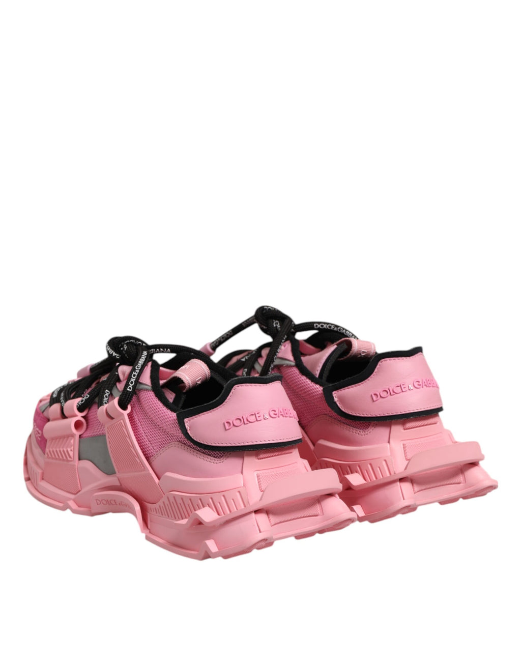 Chaussures sneakers basses roses Dolce & Gabbana pour femmes, style space, vue de côté avec détails colorés et logo.