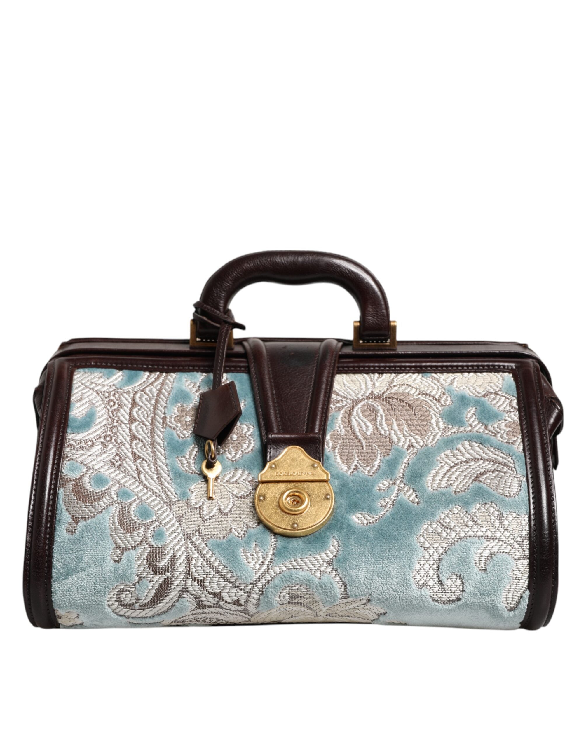 Sac à main de voyage Dolce & Gabbana en cuir bleu et marron avec jacquard floral, élégant et spacieux.