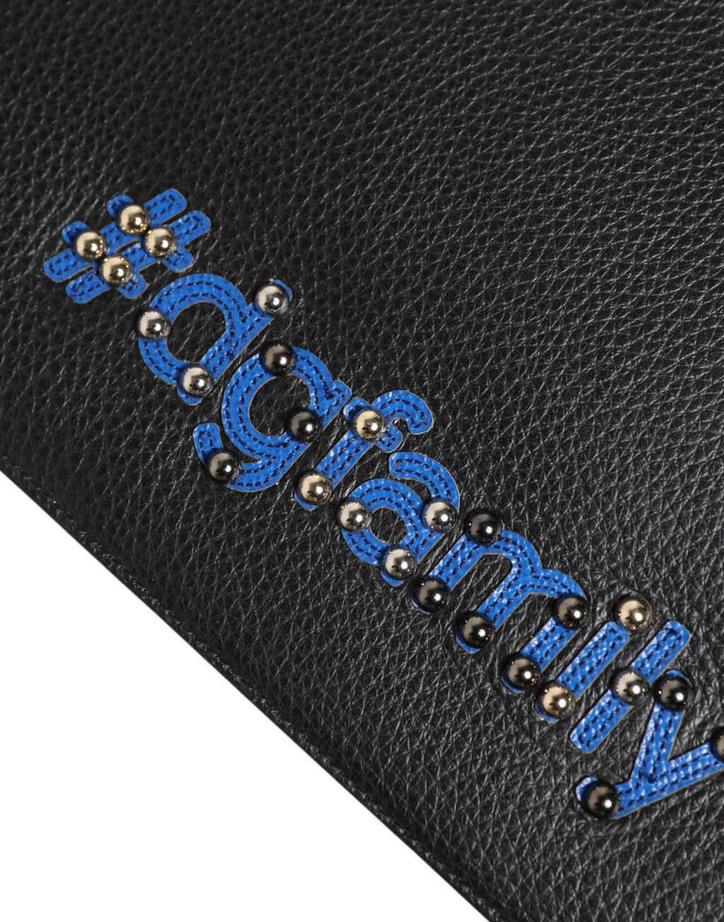 Pochette homme Dolce & Gabbana en cuir noir avec embellissements, sac de soirée élégant et compact.