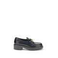 Mocassins Gucci en cuir de veau noir Bos Taurus, slip-on élégants pour homme, avec finition de haute qualité.