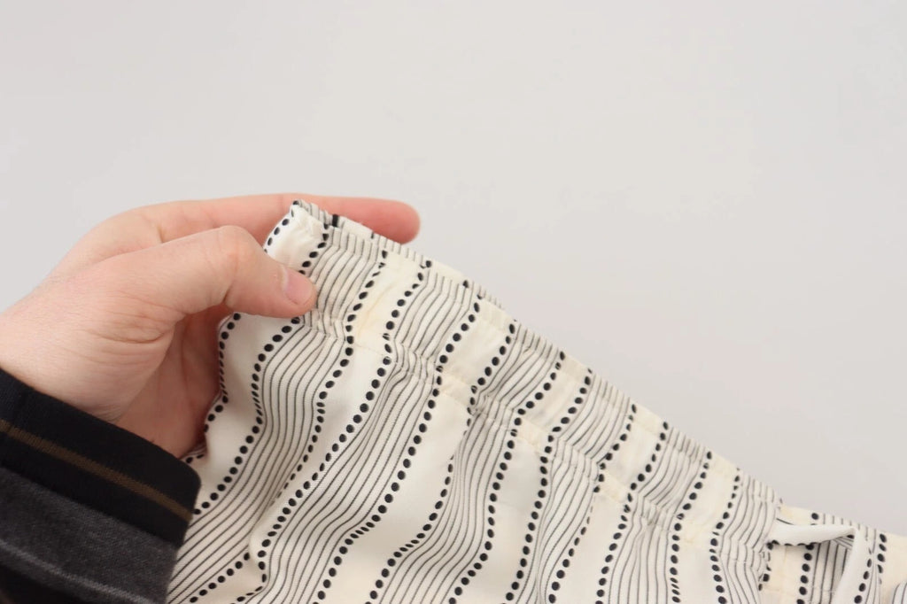 Pantalon de détente en soie blanche à rayures Dolce & Gabbana, pantalon confortable et élégant pour la maison.