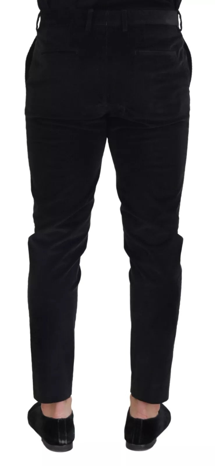 Pantalon chino slim en coton stretch noir de Dolce & Gabbana, vue de face, détail de la coupe ajustée et de la texture du tissu.