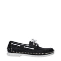 Mocassins en cuir noir Christian Louboutin pour homme, élégants et confortables, avec semelle en cuir et finition soignée.