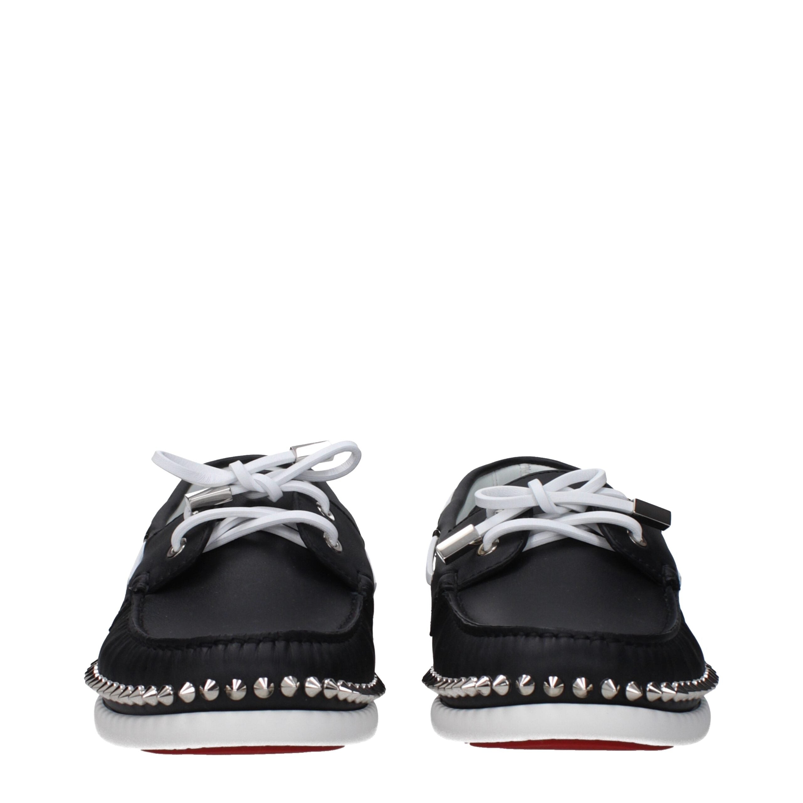 Mocassins Christian Louboutin en cuir noir à enfiler, élégants et classiques, avec semelle en cuir et design sophistiqué.