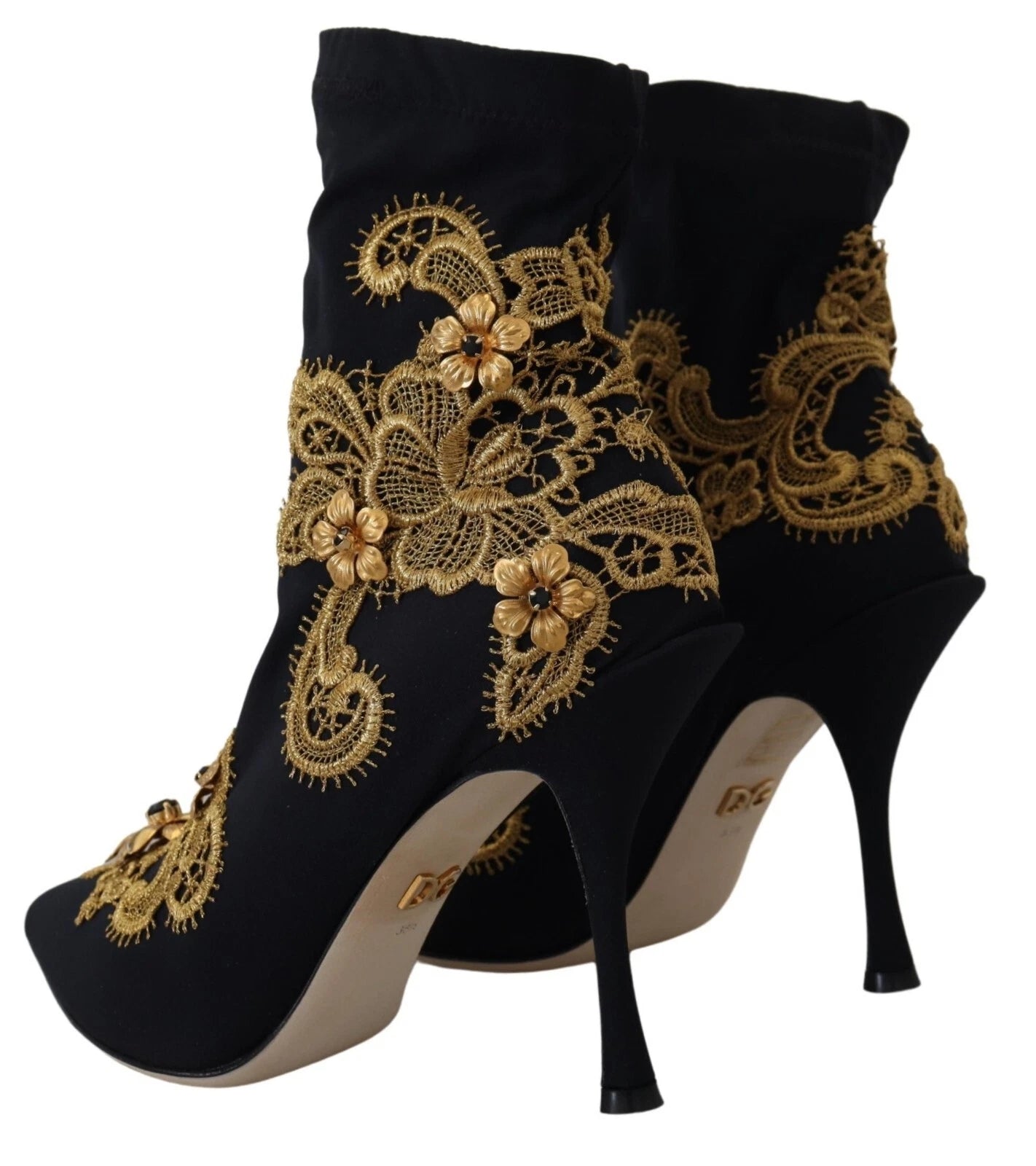 Bottes noires Dolce & Gabbana avec broderies or, cristaux et design élégant, vue de face sur fond neutre.