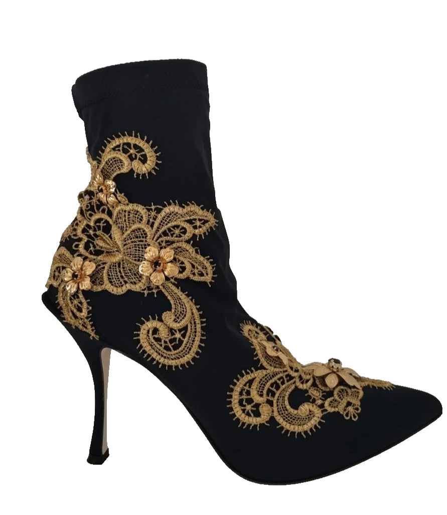 Bottes noires de Dolce & Gabbana avec broderie dorée et cristaux, élégantes chaussures en cuir à talons.
