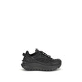 Sneakers athlétiques Moncler Bos Taurus en cuir de veau noir, style sportif et moderne.