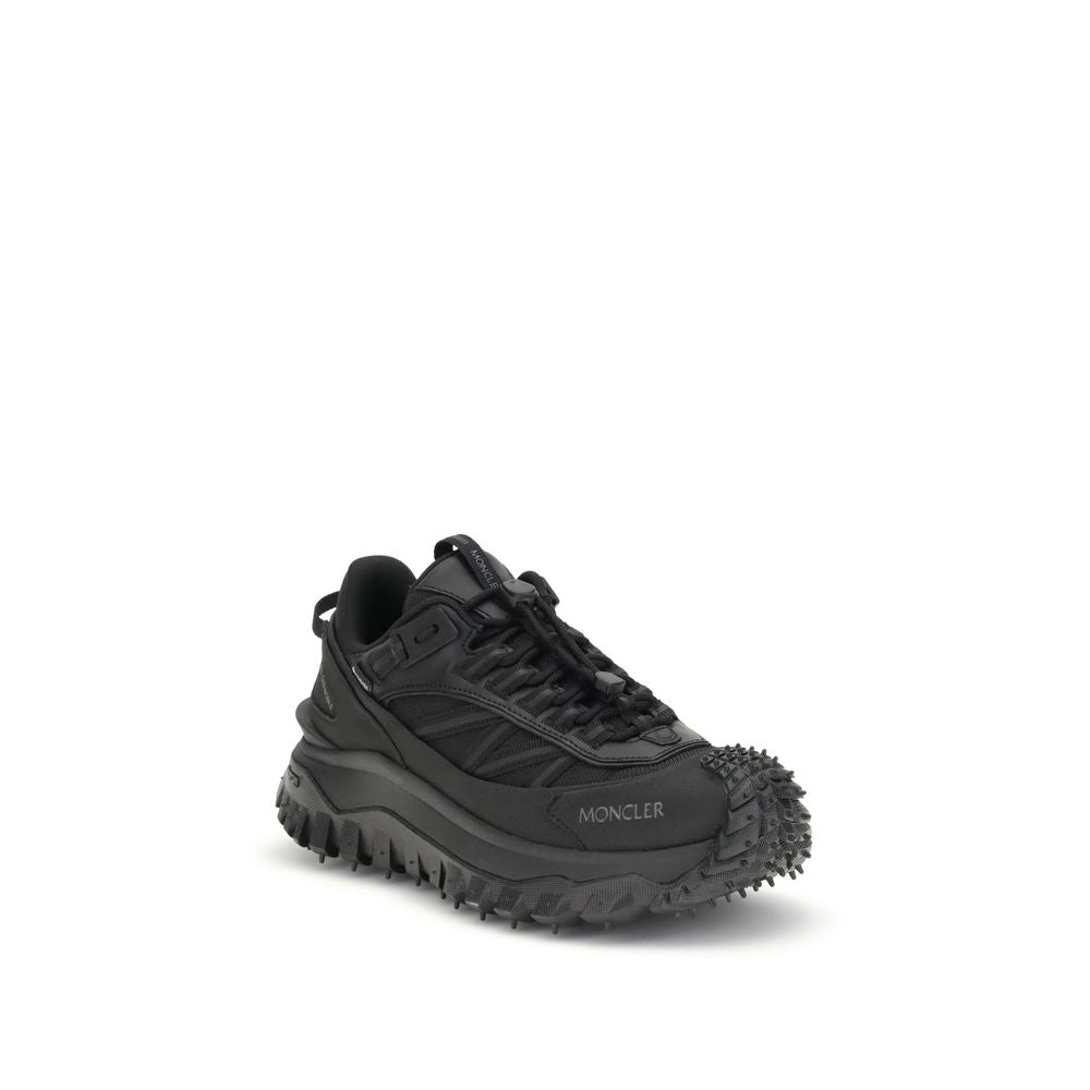 Chaussures de sport Moncler Bos Taurus en cuir de veau noir, baskets athlétiques élégantes et confortables.