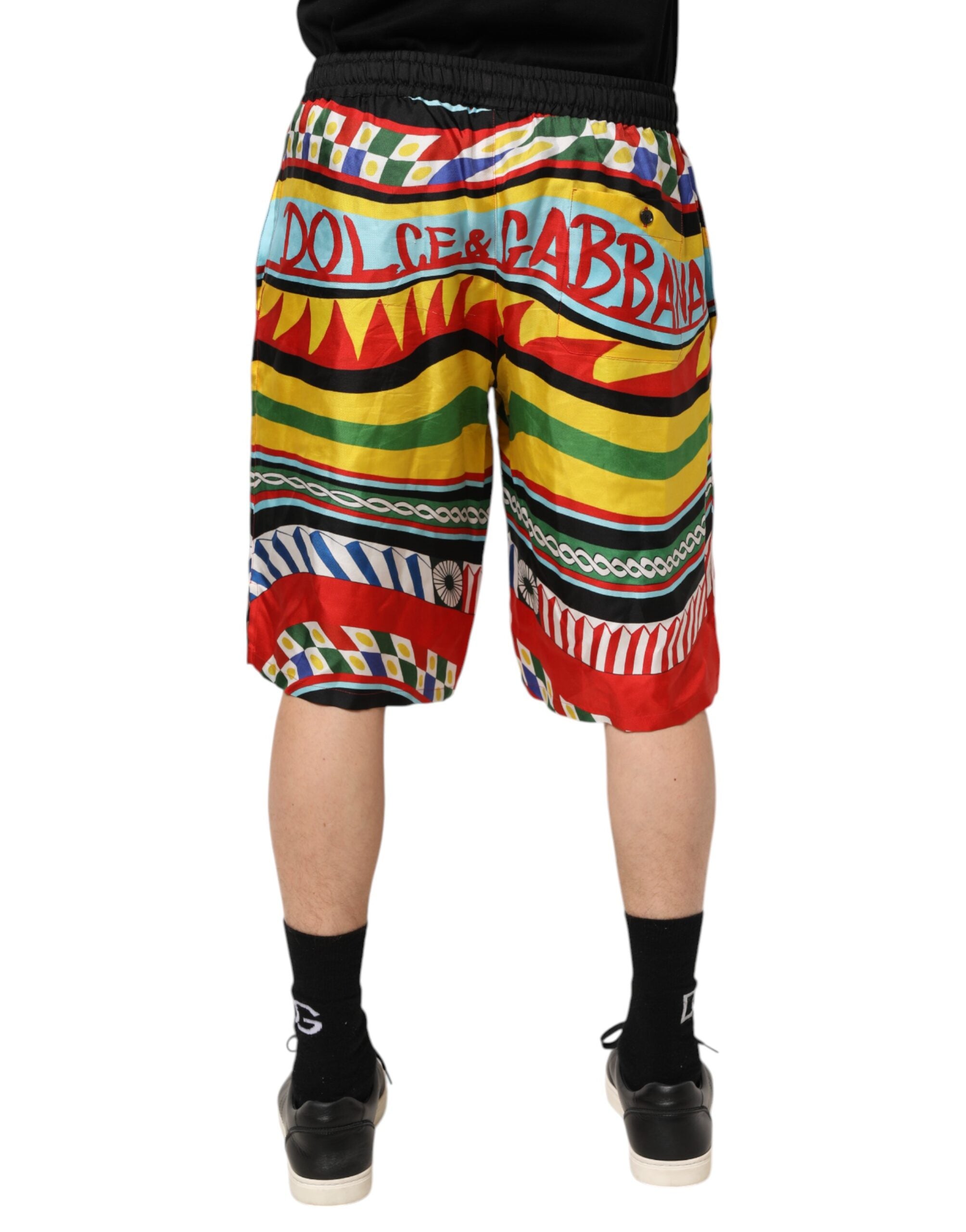 Shorts de bain Dolce & Gabbana Sicilian Carretto multicolores avec motif traditionnel, style estival et vibrant.