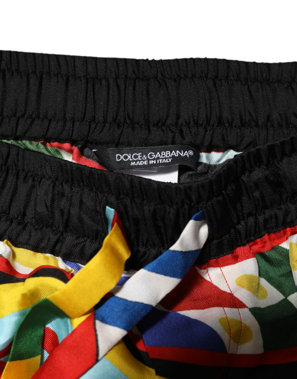 Shorts de bain Dolce & Gabbana multicolores avec motif Sicilian Carretto, style estival et design vibrant.