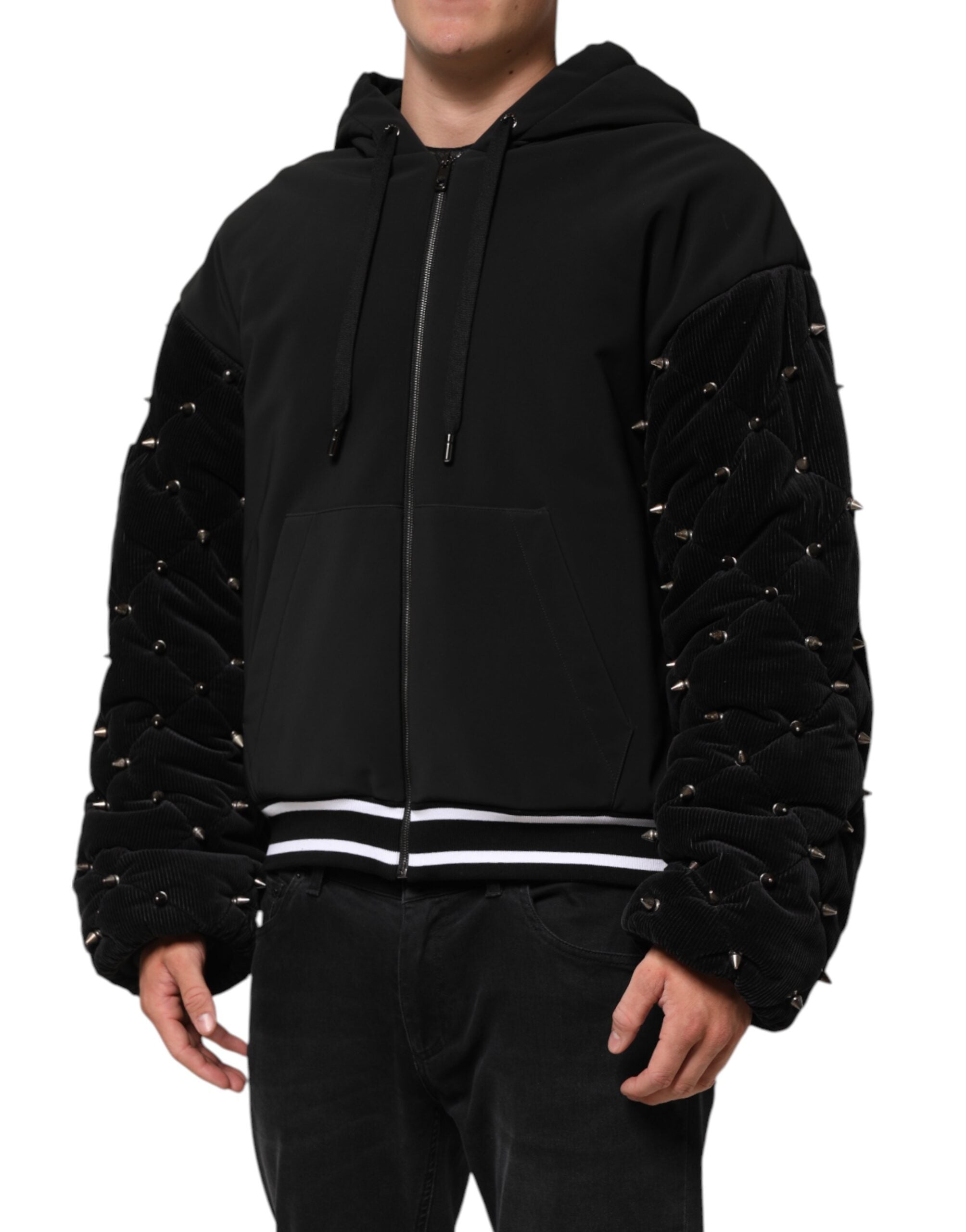 Veste à capuche en coton noir Dolce & Gabbana, matelassée avec studs sur les manches, style tendance et moderne.