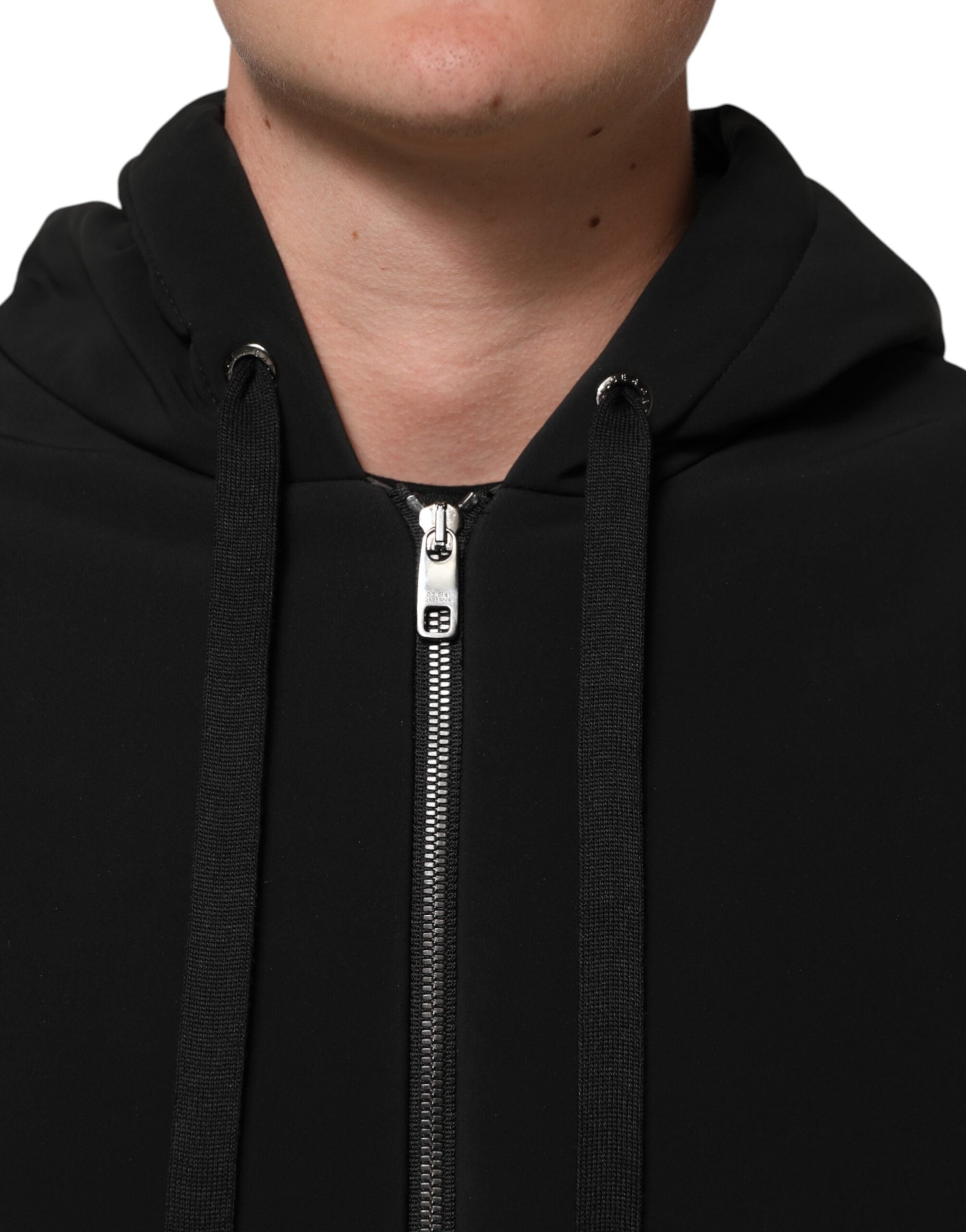 Veste à capuche en coton noir de Dolce & Gabbana avec quilting, studs sur les manches et design élégant.