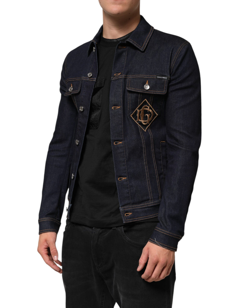 Veste en denim bleu indigo slim fit Dolce & Gabbana avec logo et patch, vue de face.