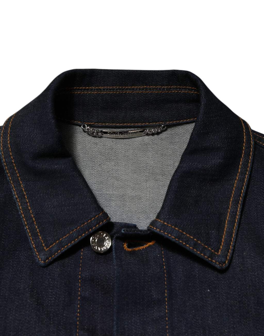 Veste en jean slim fit bleu indigo avec logo et patch Dolce & Gabbana, style décontracté et moderne.