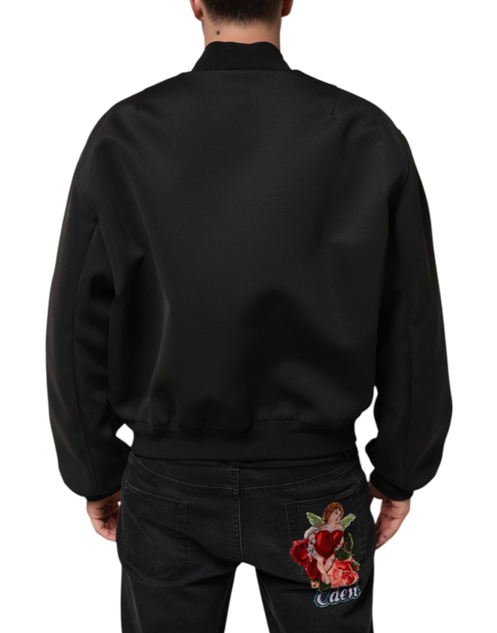 Veste bomber noire en polyester avec logo Dolce & Gabbana, plaque à l'avant, style élégant et moderne.