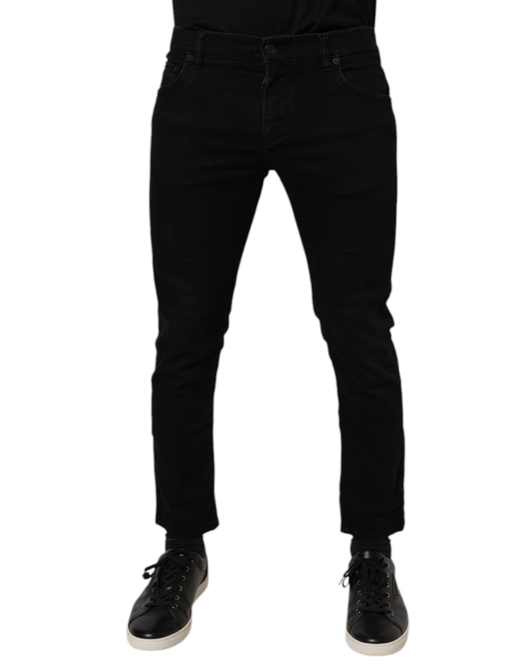 Pantalon homme Dolce & Gabbana en coton noir, coupe skinny, style jean ajusté, visible en détail dans l’image.