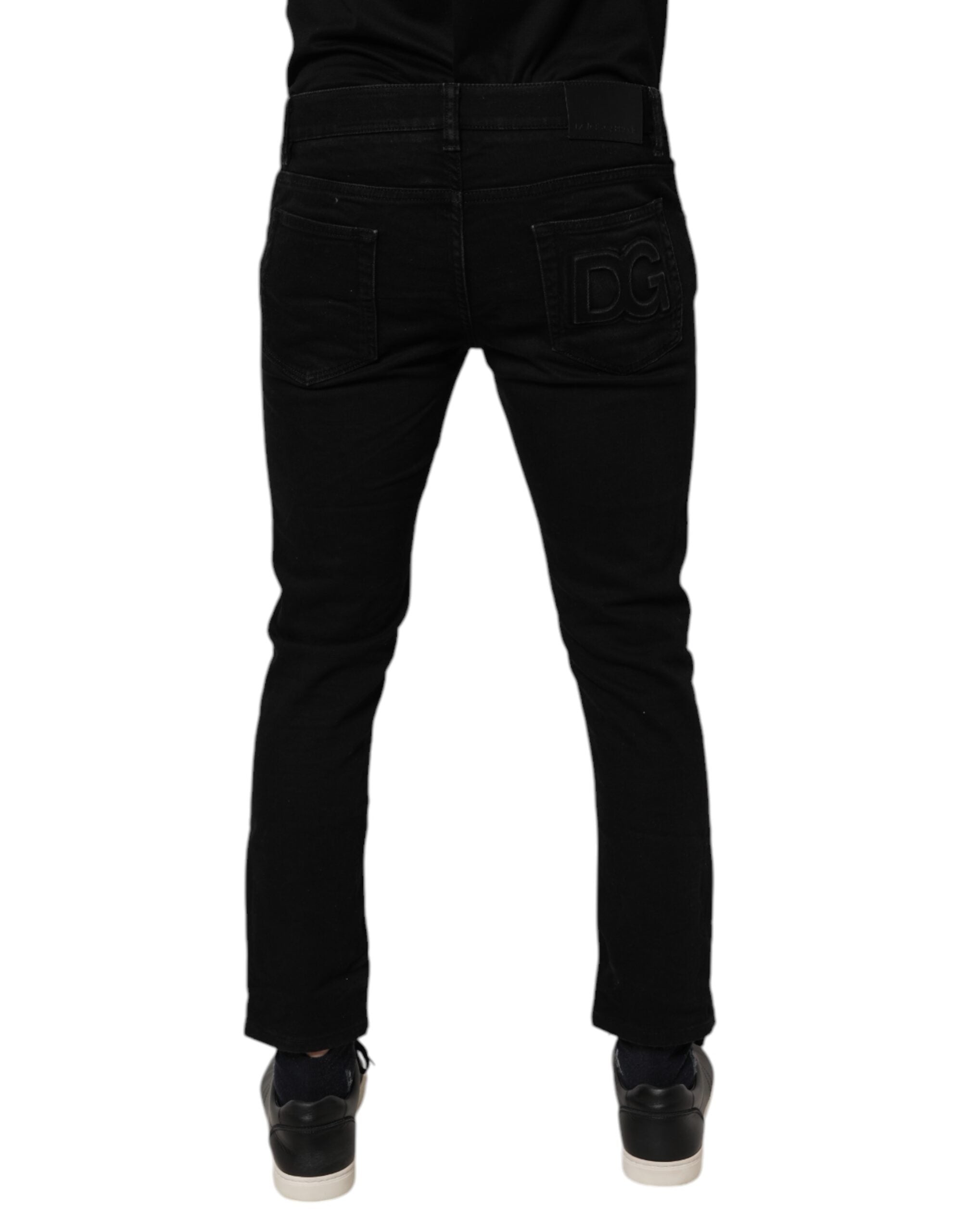 Jeans skinny en coton noir de la marque Dolce & Gabbana pour homme, pantalon ajusté avec détails modernes.