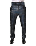 Pantalon homme Dolce & Gabbana en soie bleue argentée brillante, coupe skinny, pantalon élégant et sophistiqué.