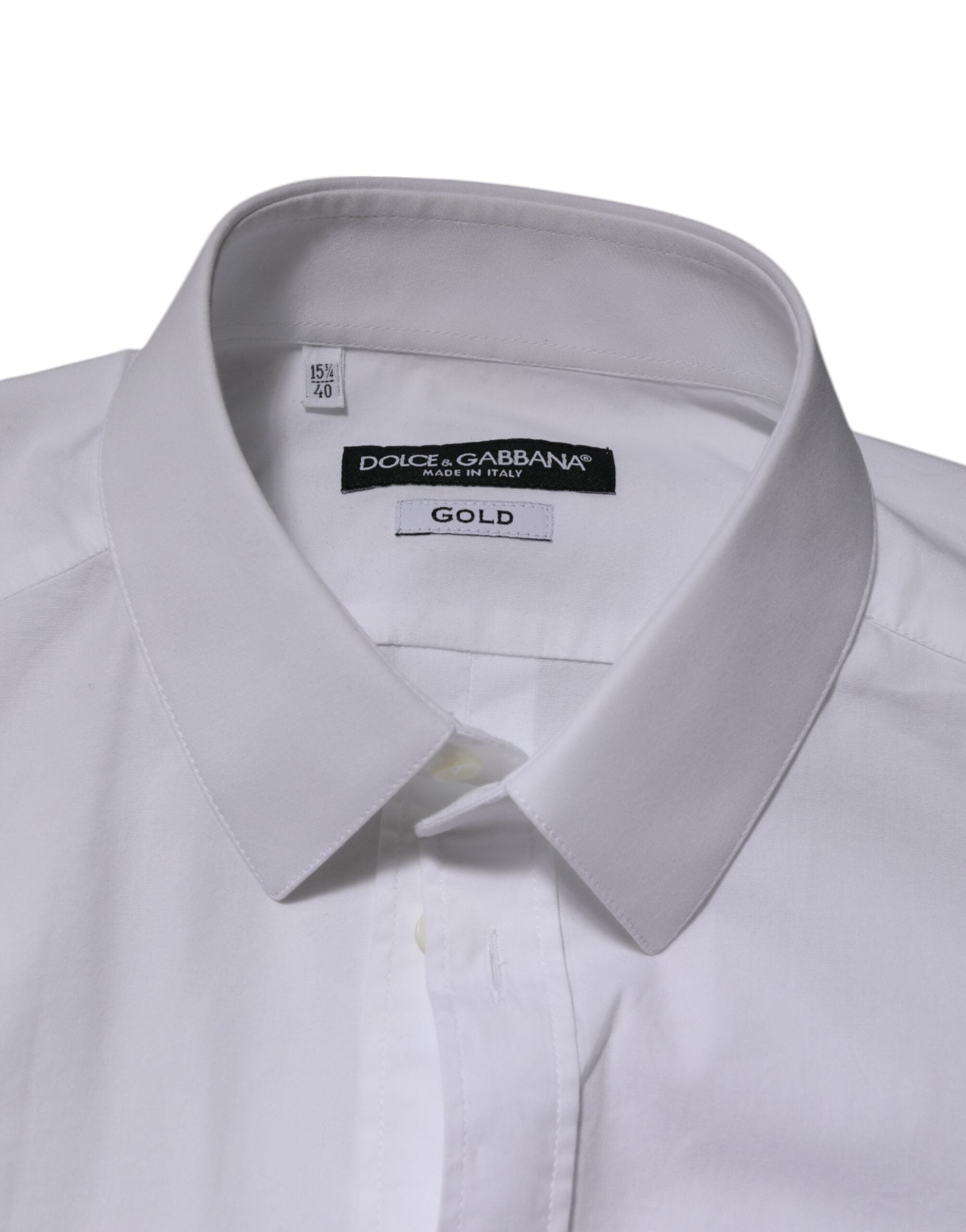 Chemise homme Dolce & Gabbana en coton blanc à manches longues, style formel avec détails dorés élégants.