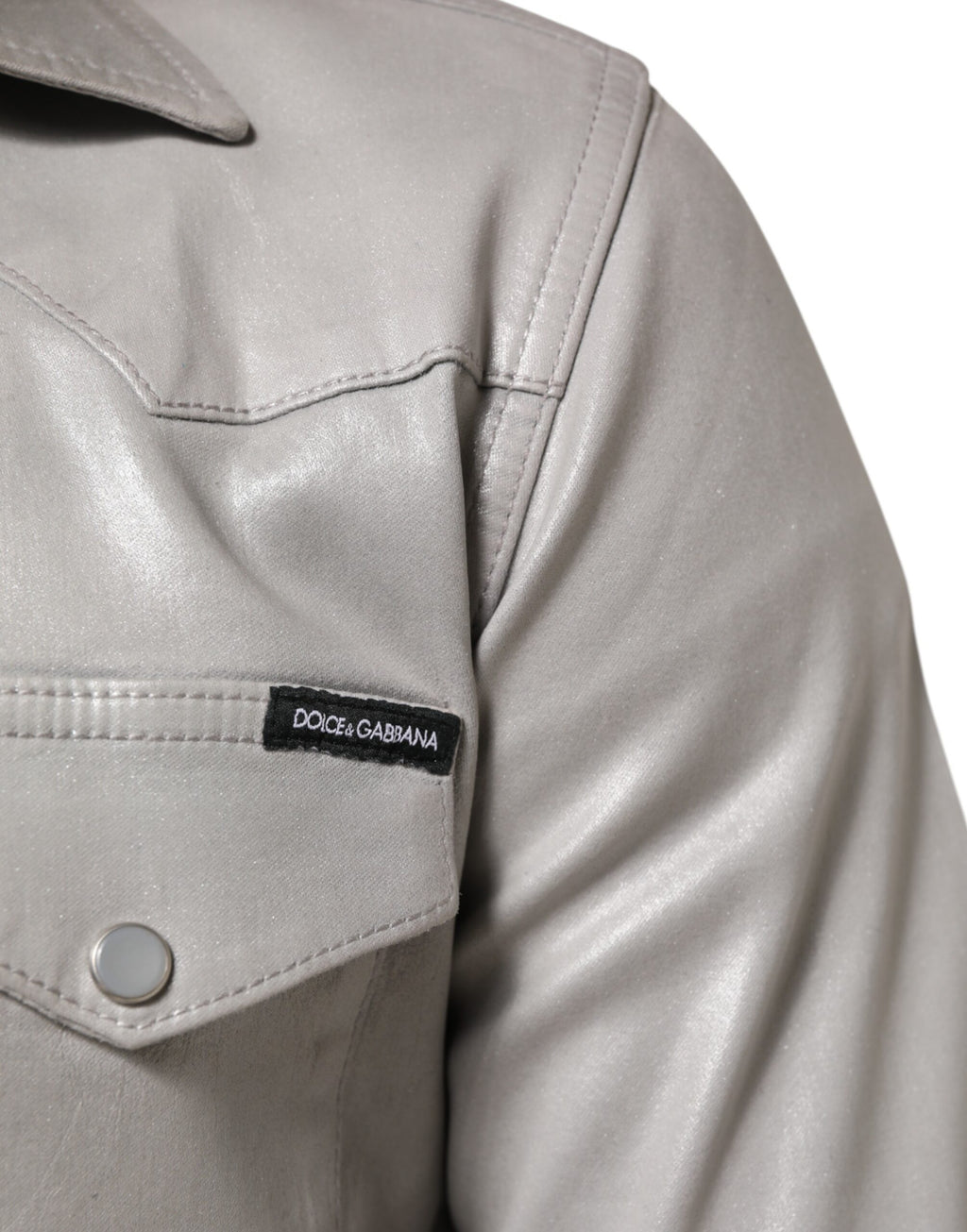 Chemise homme Dolce & Gabbana en coton gris métallique à boutons, style élégant et moderne.