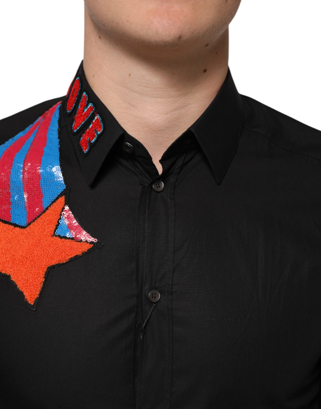 Chemise formelle pour homme Dolce & Gabbana en coton noir avec étoiles à sequins, élégante et sophistiquée.