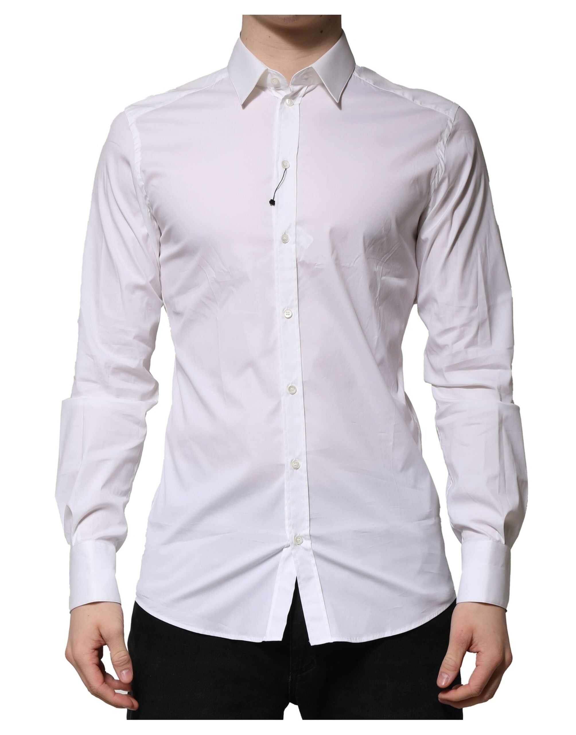 Chemise formelle blanche en coton Dolce & Gabbana à manches longues avec détails en or, vue de face.