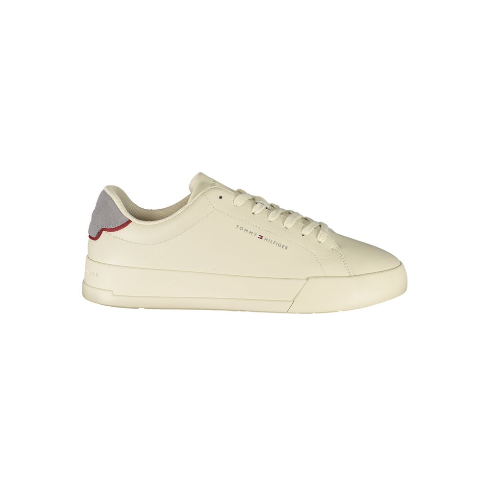 Chaussure sneaker beige en polyuréthane pour homme de la marque Tommy Hilfiger, vue de côté.