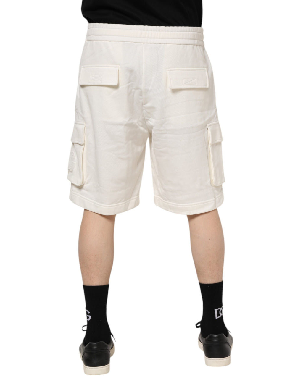 Shorts bermuda en coton blanc de Dolce & Gabbana, cargo, style décontracté, avec poches et logo de la marque visible.
