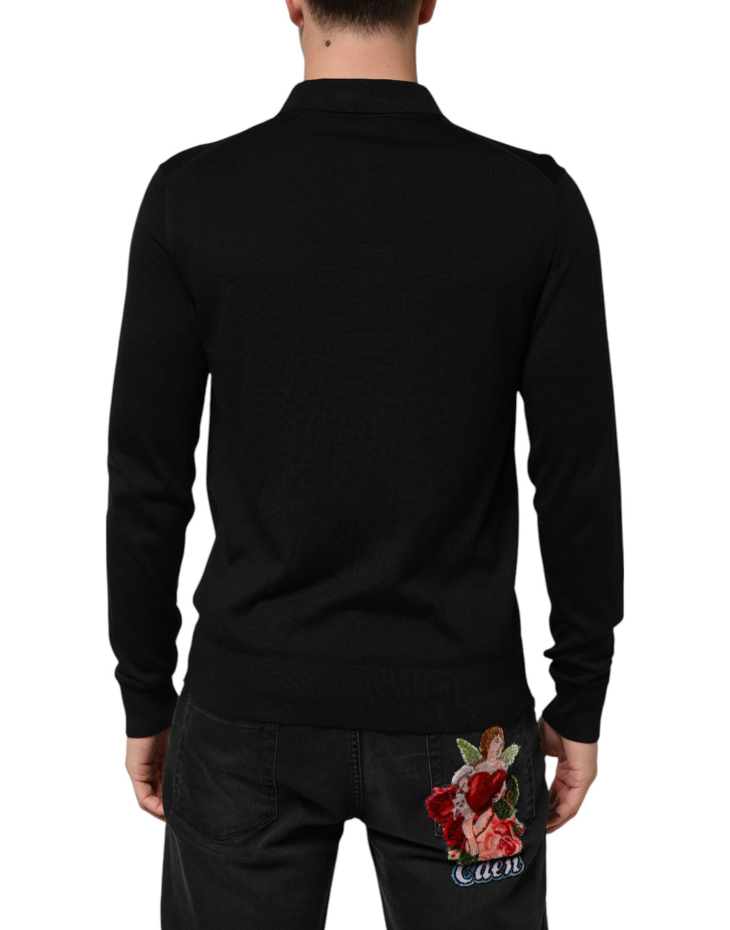 Pull léger en soie noir Dolce & Gabbana, chemise boutonnée élégante pour femme, finition raffinée et tissu fluide.