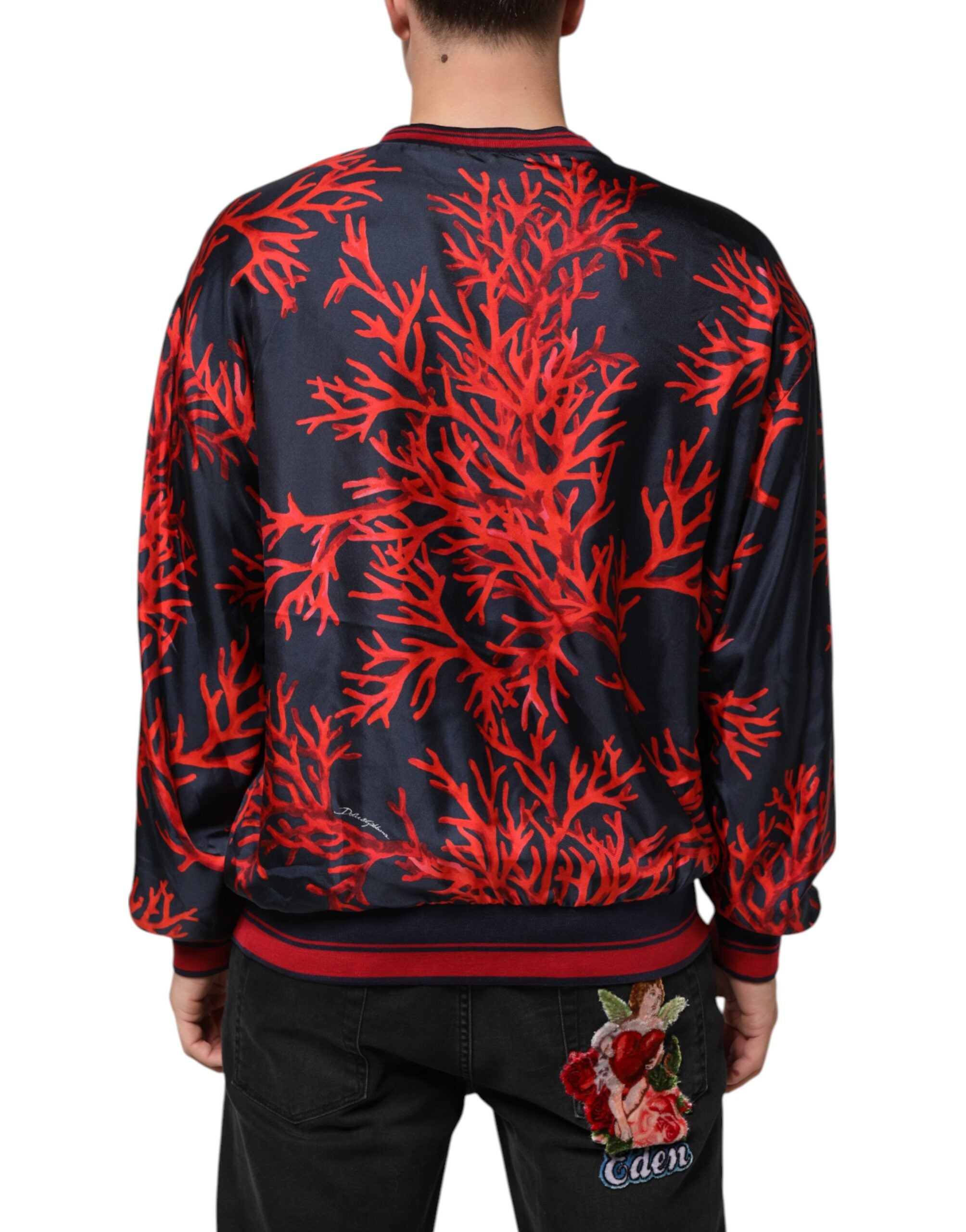 Pull-over en soie Dolce & Gabbana à motif corail rouge et marine, élégant et confortable.