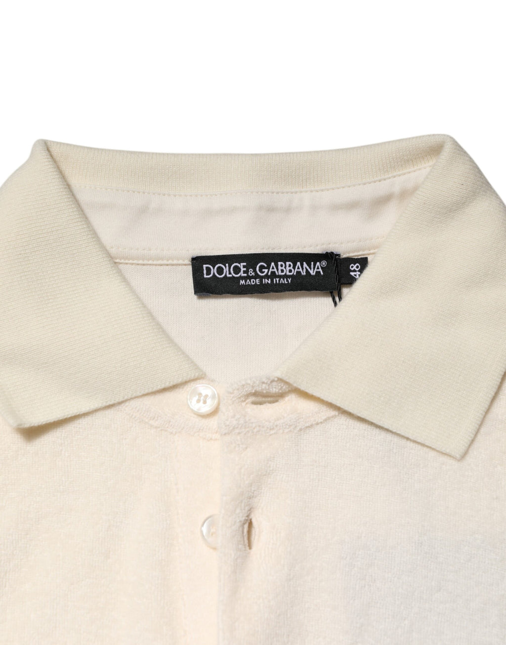 T-shirt polo en coton ivoire Dolce & Gabbana avec logo, poche à la poitrine, style décontracté et élégant.