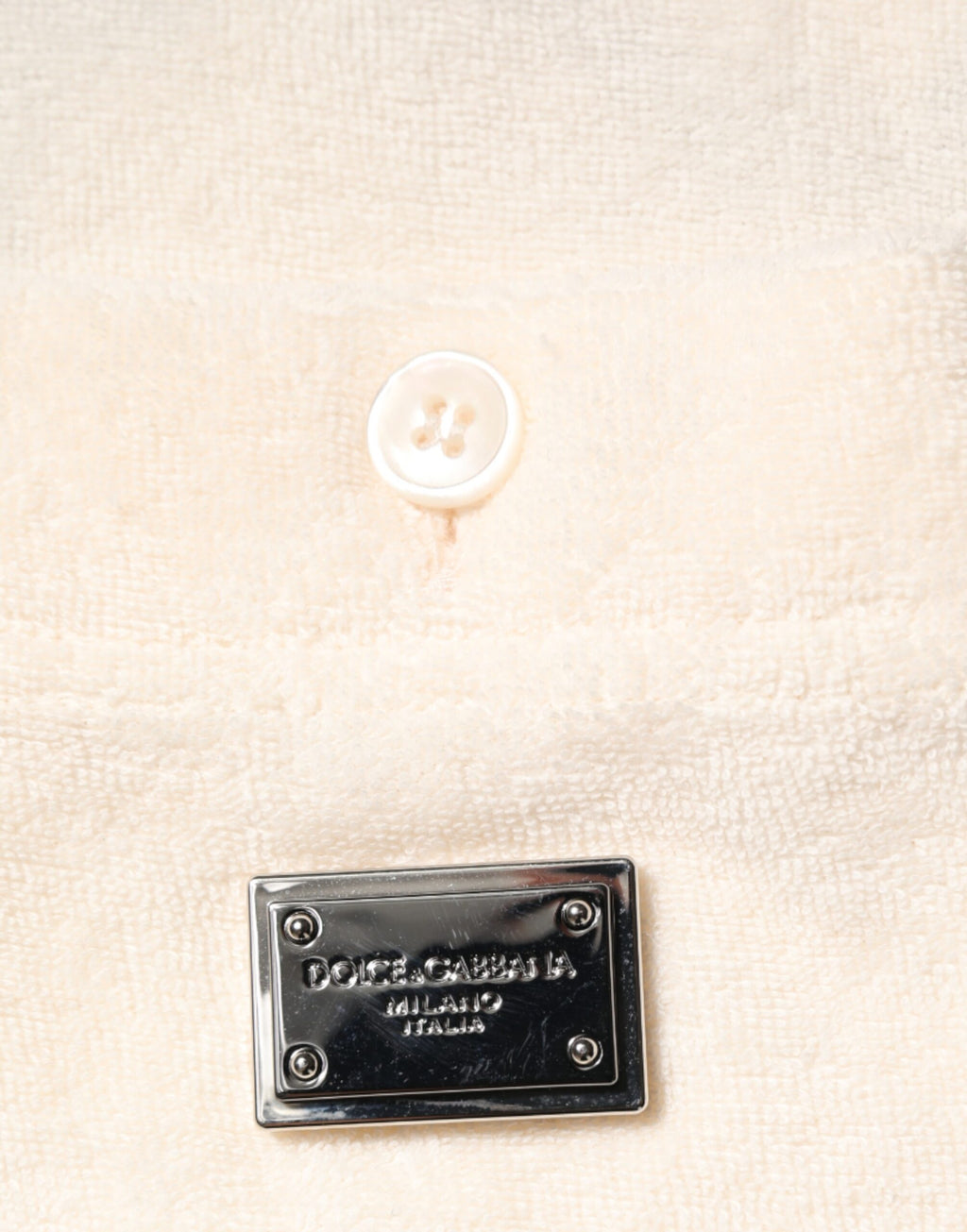 T-shirt polo homme Dolce & Gabbana en coton écru avec logo et poche, style décontracté et élégant.