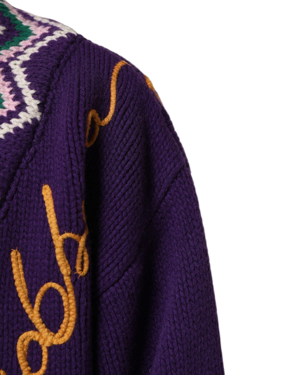 Pull pour homme en laine violette Dolce & Gabbana avec logo DG, col rond et motif tricoté, élégant et confortable.