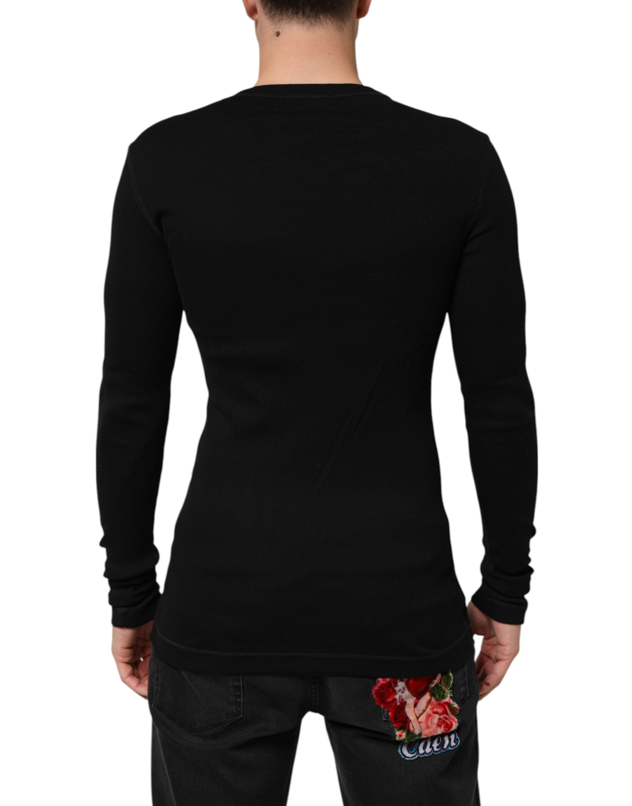 Cardigan homme Dolce & Gabbana en coton noir avec boutons, style élégant et classique.