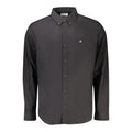 Chemise pour homme Calvin Klein en coton noir, col classique et manches longues, vue de face.