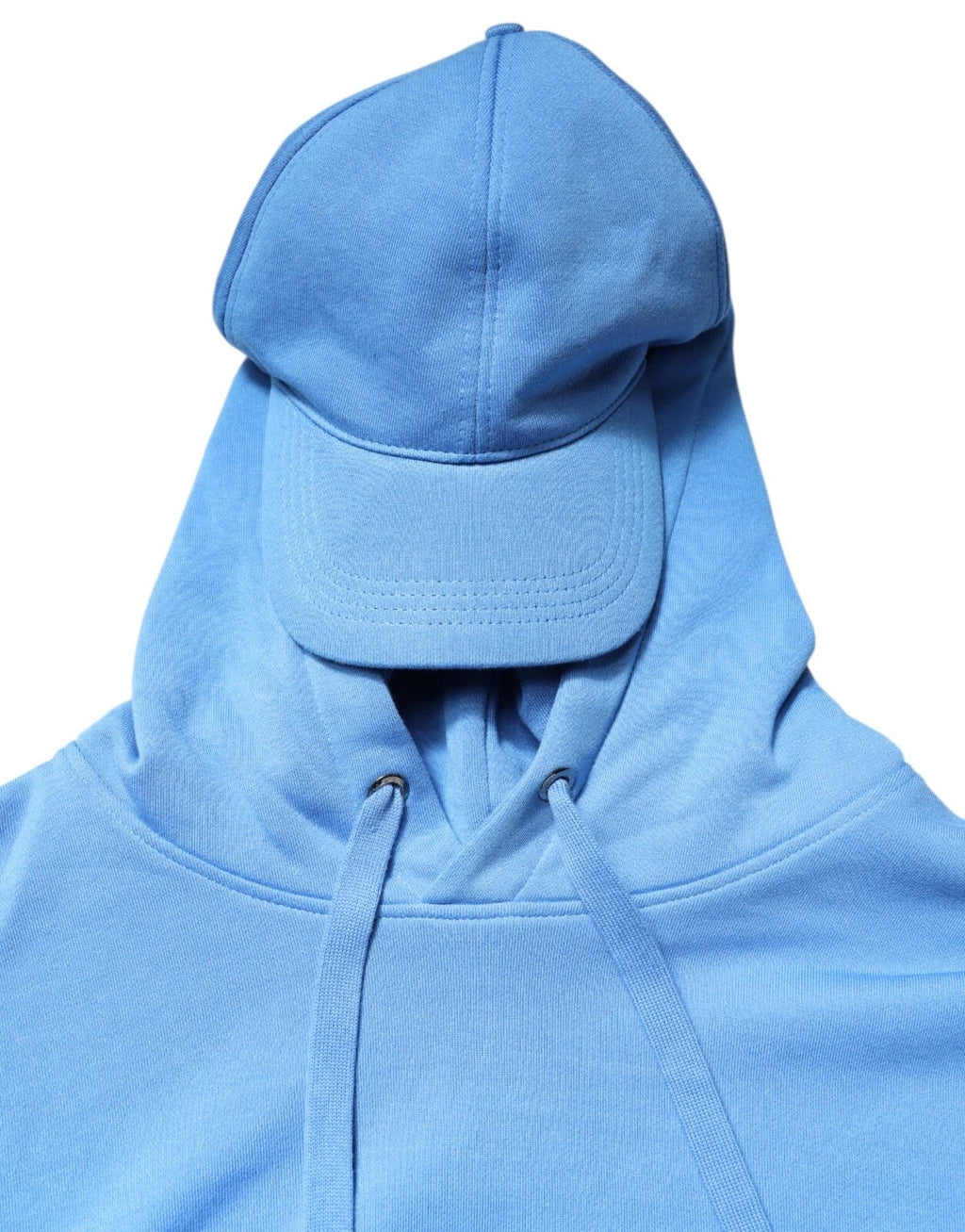 Veste sportswear homme Dolce & Gabbana en coton bleu avec capuche, coupe unique, vue de face.