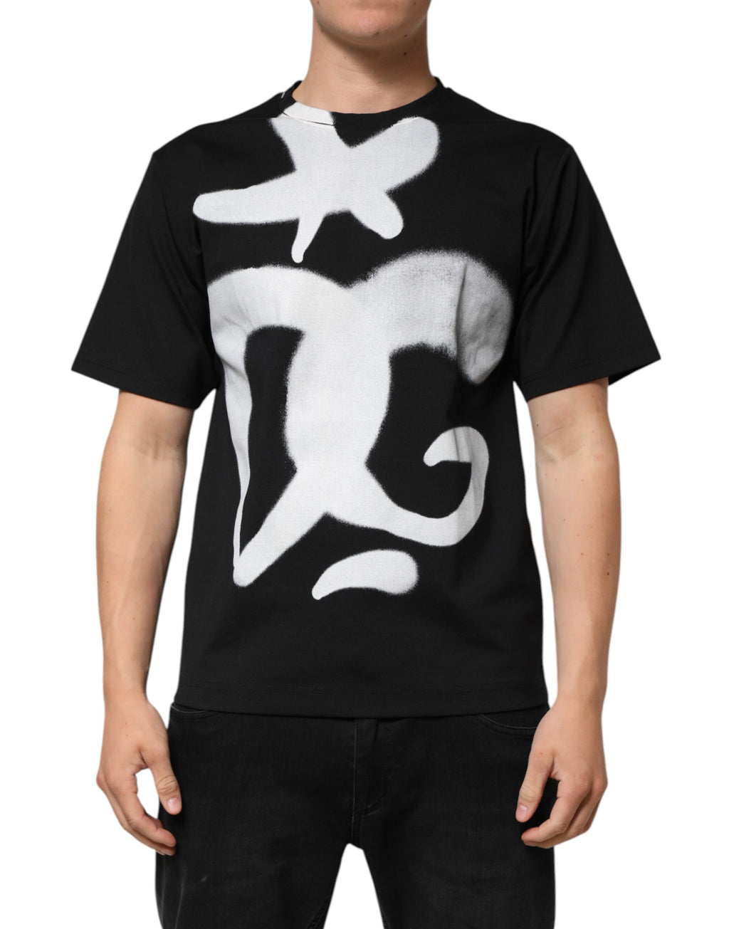 T-shirt à manches courtes noir Dolce & Gabbana en coton avec logo DG et motif graffiti, mode urbaine élégante.