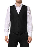 Gilet homme en laine noire Dolce & Gabbana, vêtement formel élégant pour occasions spéciales, ajusté et sophistiqué.