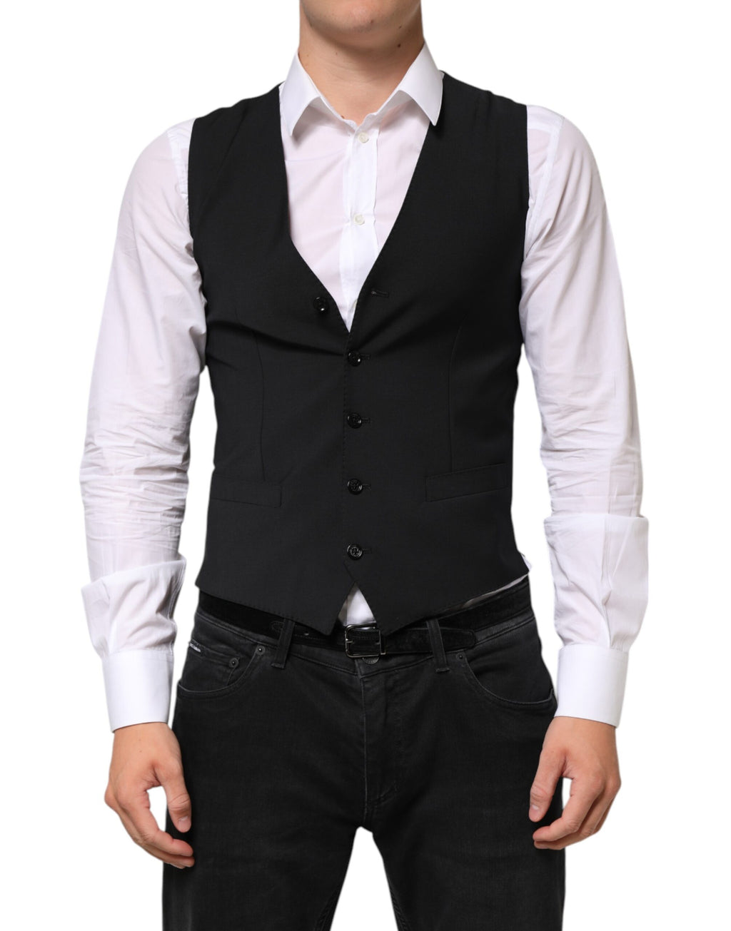 Veste homme Dolce & Gabbana en laine noire, élégante, ajustée, avec col en V et fermeture à boutons pour un style formel.