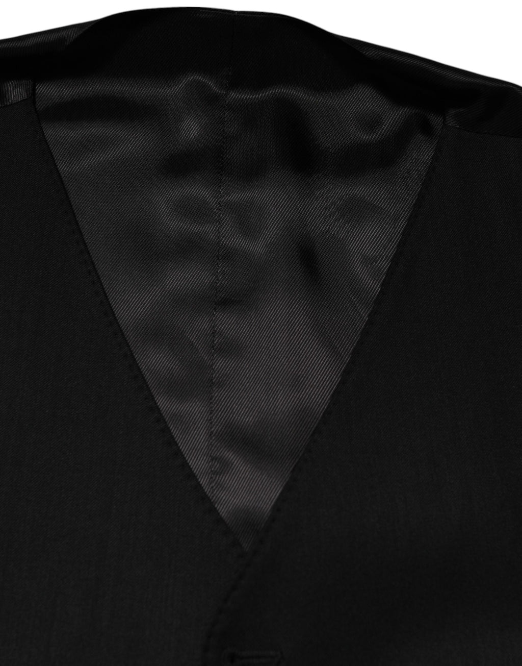 Gilet homme en laine noire Dolce & Gabbana, vêtement formel élégant avec coupe ajustée et finition soignée.