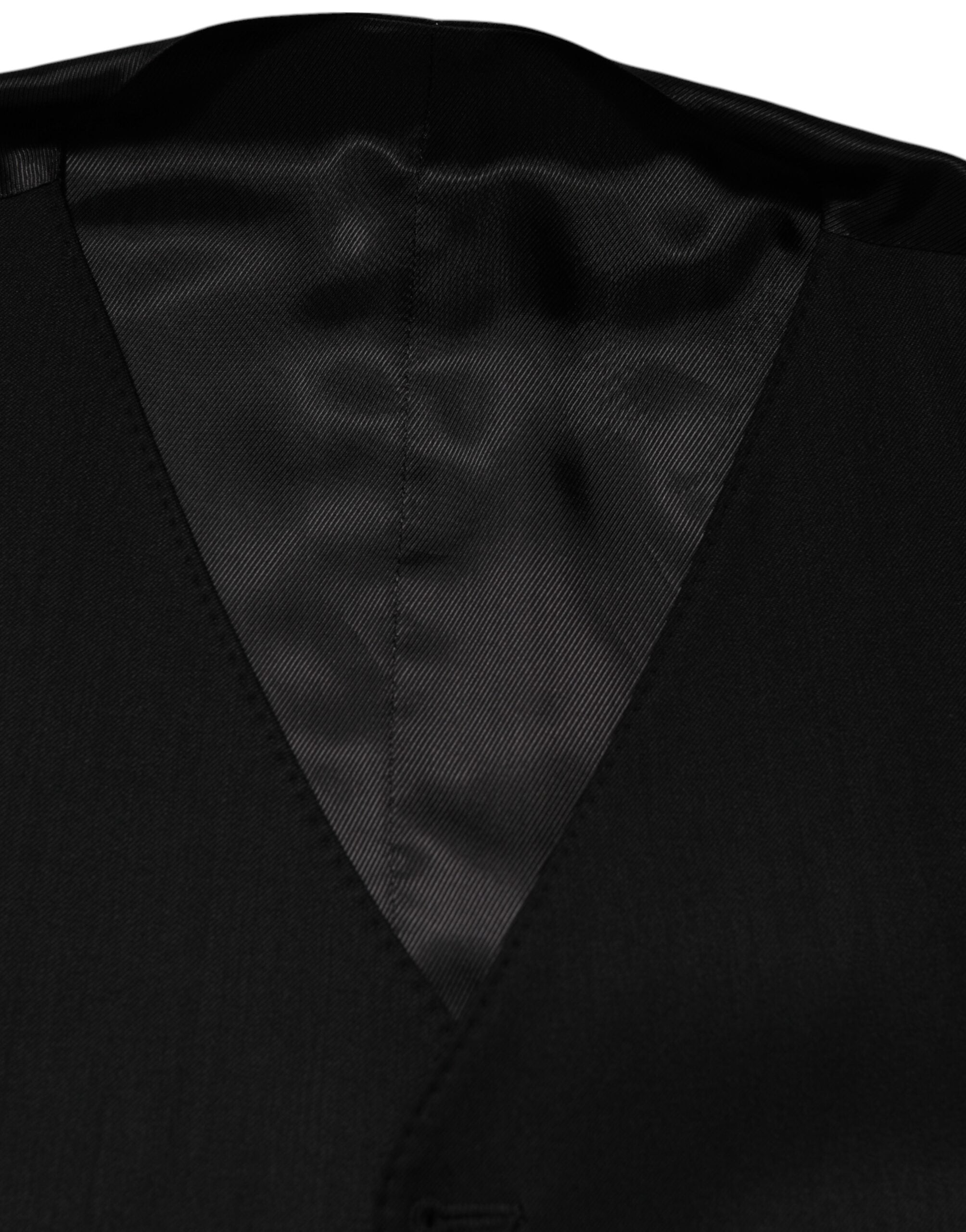 Gilet homme en laine noire Dolce & Gabbana, vêtement formel élégant avec coupe ajustée et finition soignée.