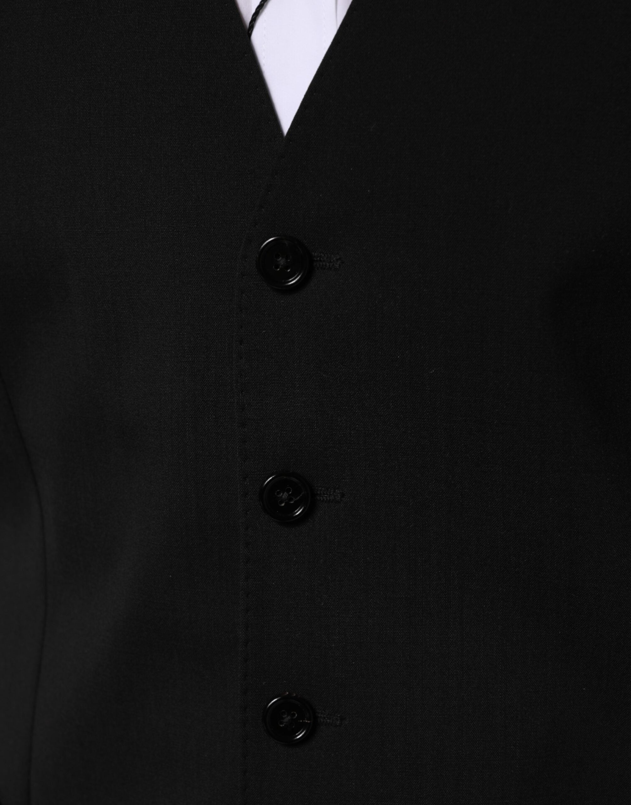 Gilet homme en laine noire Dolce & Gabbana, vêtement formel, ajusté, avec col en V, parfait pour occasions élégantes.