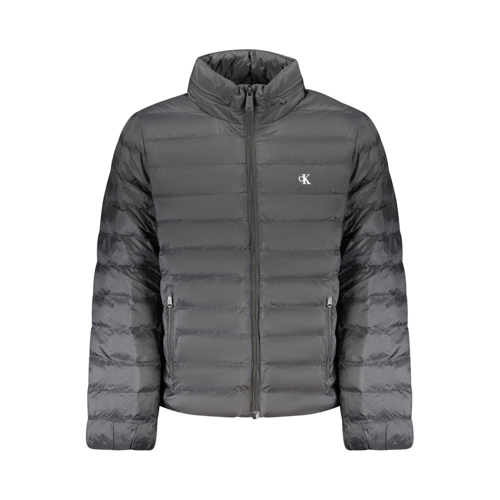 Veste pour homme Calvin Klein en poliammide noire, style moderne et coupe ajustée, visible en image.