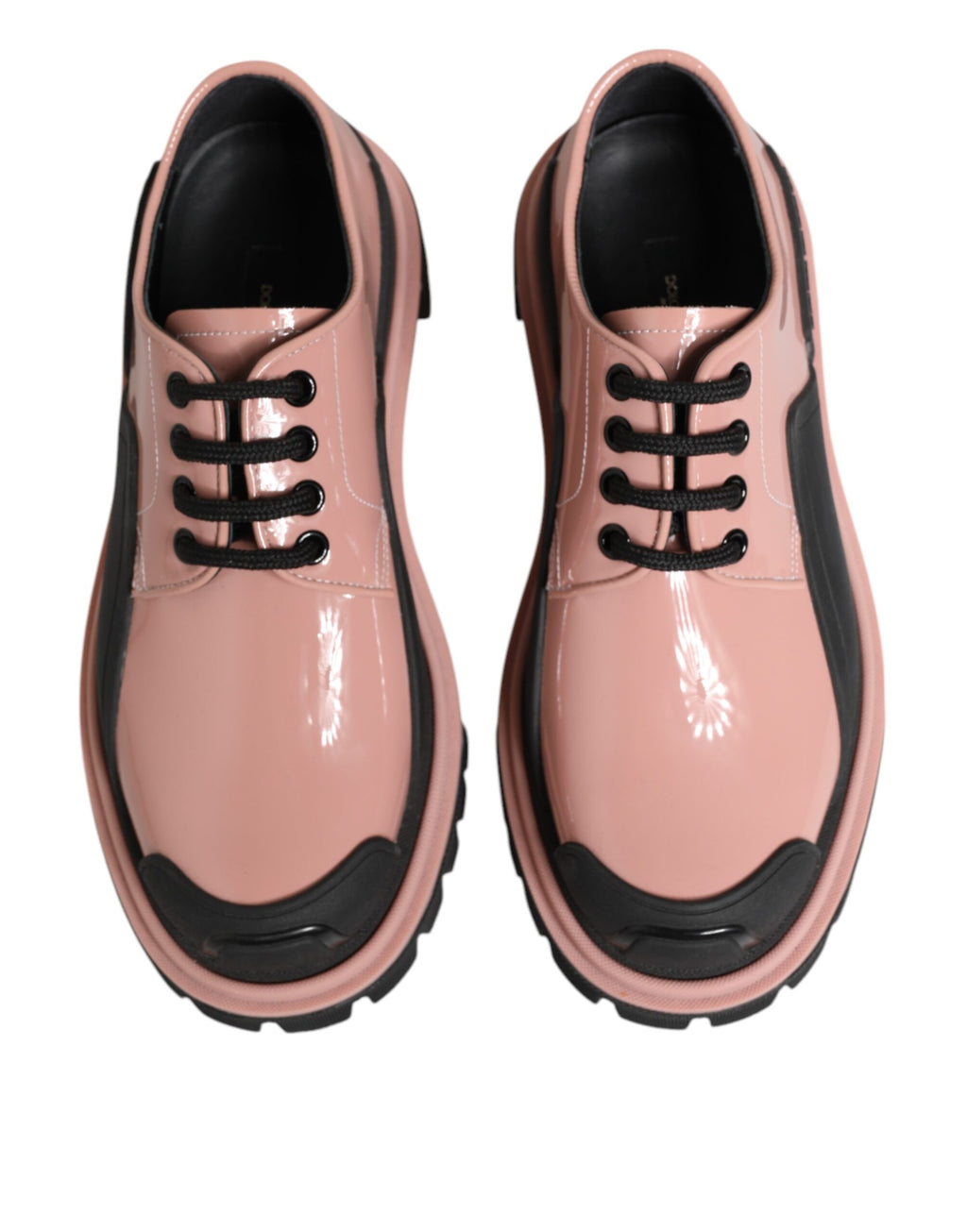 Chaussures en cuir noir et rose pâle Dolce & Gabbana avec lacets, élégantes et sophistiquées, vues de face.